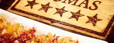La imagen 37 de la Empresa ENRIQUE TOMÁS JAMON-TAPAS-VINO Tiendas y Productores de Alimentos en Sabadell B